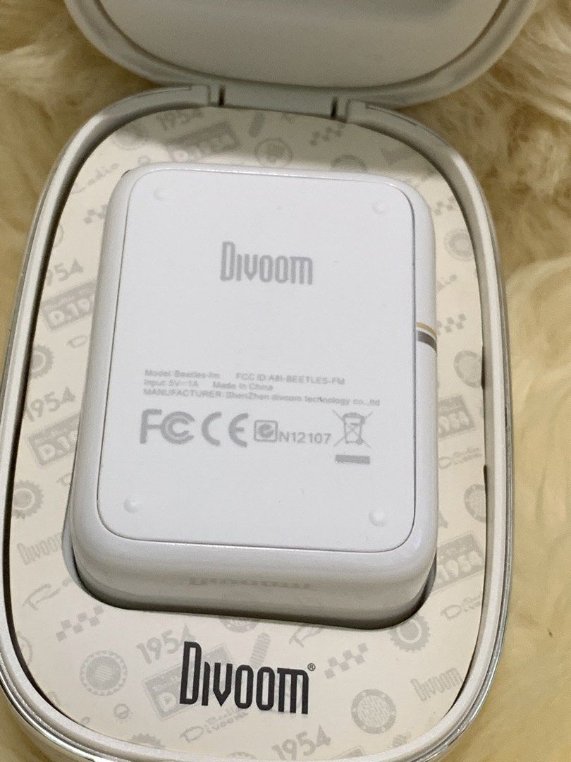 Divoom Beetle-FM Retro Bluetooth Speaker White (Category: Soundbars, Speakers & Amplifiers) located in Manila. Submitted by mylildarlingamari (Listing ID 1444316448, Image 2). Description: ❎BAWAL SA MAARTE ✅excellent working condition ✅what you see what you get ❎returns not accepted - Cute retro speaker from Divoom, model Beetle-FM. - White color with a vintage camera look. - Connects wirelessly via Bluetooth. - Includes original case and attache