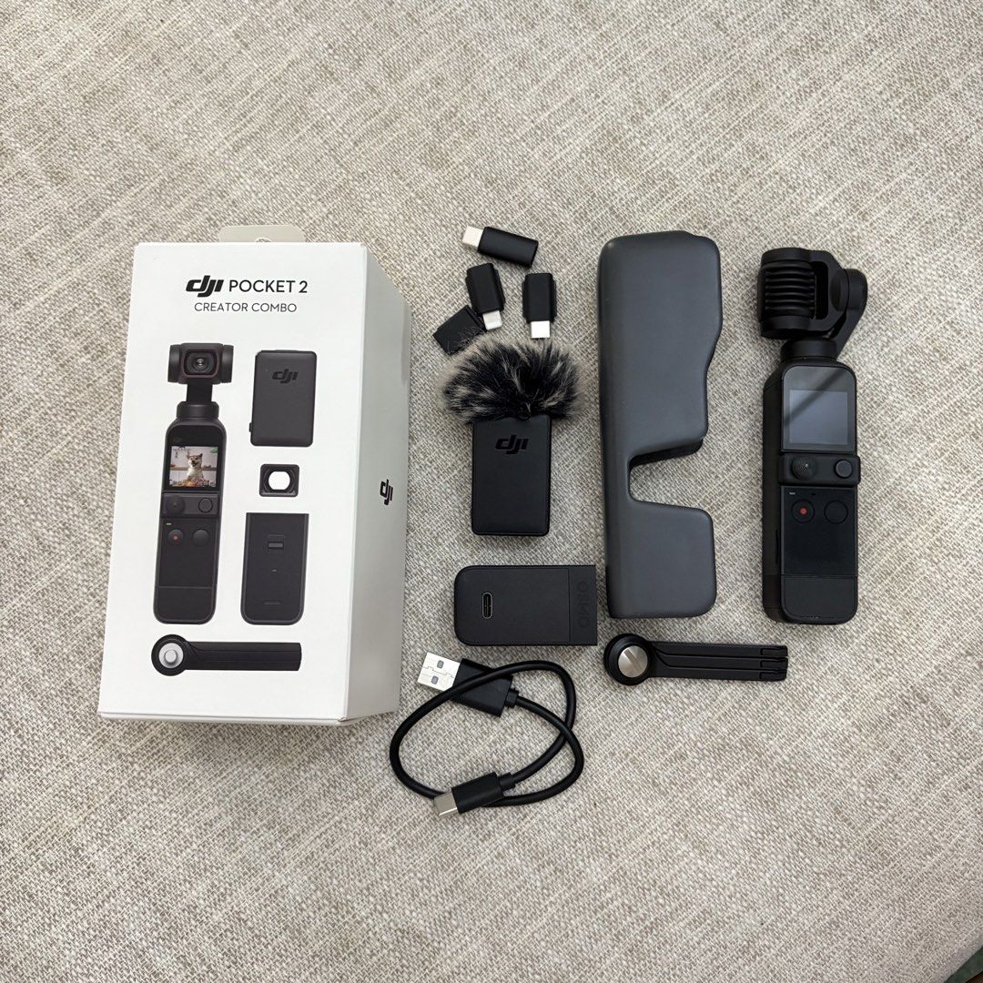 DJI Pocket 2 Creator Combo Gimbal Camera (Category: Cameras) located in Paranaque City. Submitted by aamlicup51680 (Listing ID 1444321868, Image 3). Description: - DJI Pocket 2 Creator Combo - Includes gimbal camera, charging case, wind protection mic, and other accessories - Ideal for vlogging and capturing smooth footage - All items are in the box.