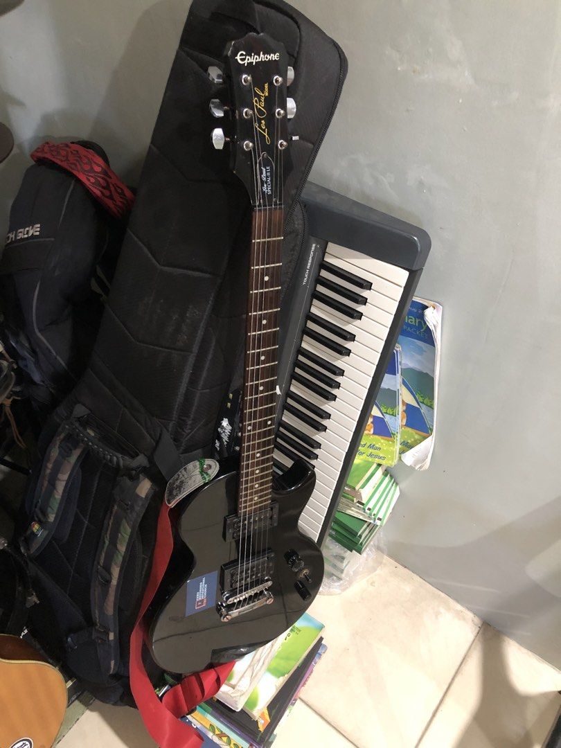 Epiphone Les Paul Special-II Electric Guitar (Category: Musical Instruments) located in Alburquerque. Submitted by wildforest.ea4e9c (Listing ID 1444320669, Image 1). Description: - Black Epiphone Les Paul Special-II electric guitar - Plays well - Minor scuffs on the body - Ideal for beginners or intermediate players - Comes with a gig bag - Ready for a new home.