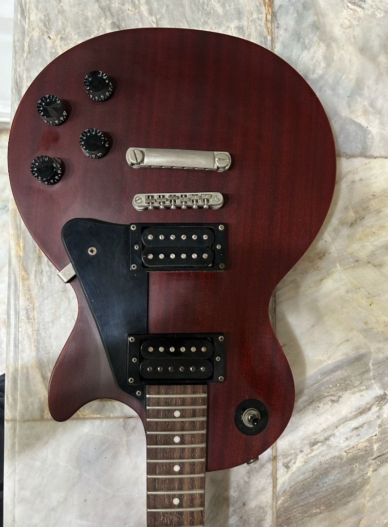 Epiphone Les Paul Studio Worn Cherry (Category: Musical Instruments) located in Manila. Submitted by nick.villanueva (Listing ID 1444487806, Image 2). Description: - Just a few bumps from gigs back in the day - No strings - No gig bag unfortunately RFS: downsizing/too many Epiphones in my collection. also planning to get a local electric guitar. price nego if rush Meetups: BGC or Clark, Pampanga.