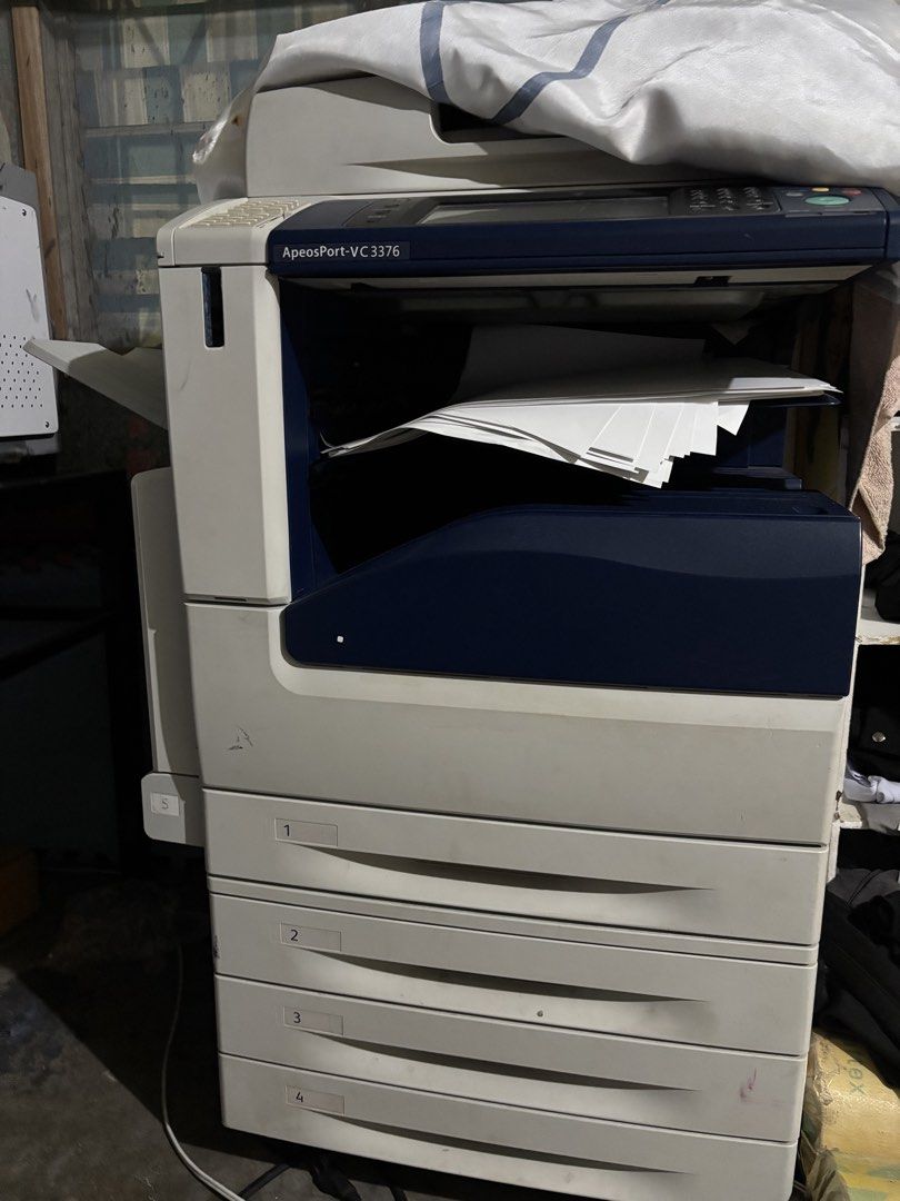 Fuji Xerox ApeosPort-VC 3376 Multifunction Printer (Category: Printers, Scanners & Copiers) located in Pasay City. Submitted by ninzlimbo (Listing ID 1444487575, Image 1). Description: - Fuji Xerox ApeosPort-VC 3376 Multifunction Printer - Total Impressions: 8661 - Color Impressions: 5018 - Black Impressions: 3643 - Color Large Impressions: 589 - Serial Number: 375295 - In excellent working condition.