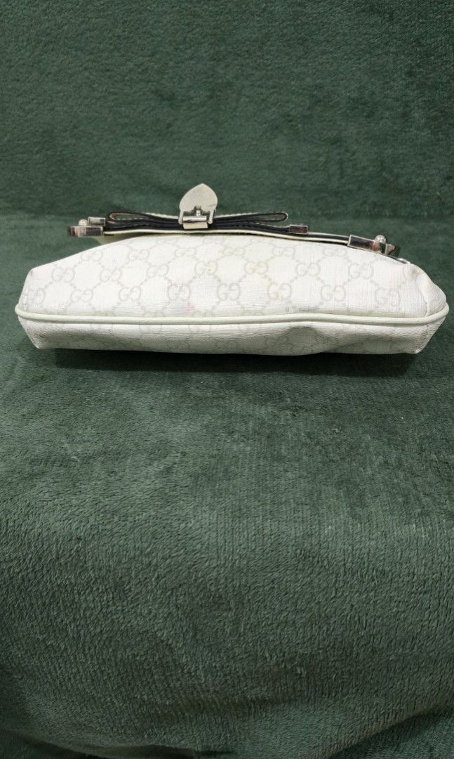 Gucci GG Monogram Heart Lock Chain Mini Bag - coded (Category: Luxury Bags & Wallets) located in Bacoor. Submitted by deux_trading_corporation (Listing ID 1444411507, Image 3). Description: 24k on 2ndhand market. condition: Rank AB - has normal signs of wear but no damage whatsoever payment first. you can always ask for discount/tawad but no to sobrang barat. no reservation. always check all the photos. some photo/s indicate the flaw..