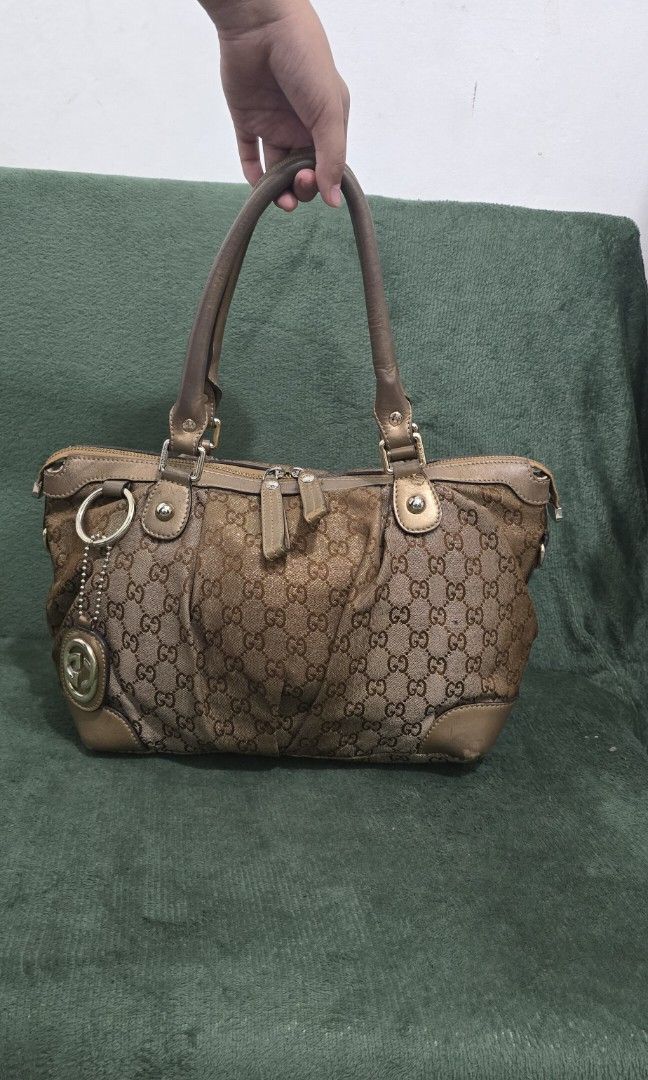 Gucci Sukey Handbag (Category: Luxury Bags & Wallets) located in Bacoor. Submitted by deux_trading_corporation (Listing ID 1444424362, Image 1). Description: 21k and above on 2ndhand market. condition: Rank AB - has normal signs of wear but no damage whatsoever. needs bags spa. payment first. you can always ask for discount/tawad but no to sobrang barat. no reservation. always check all the photos. some photo/s indicate the flaw..