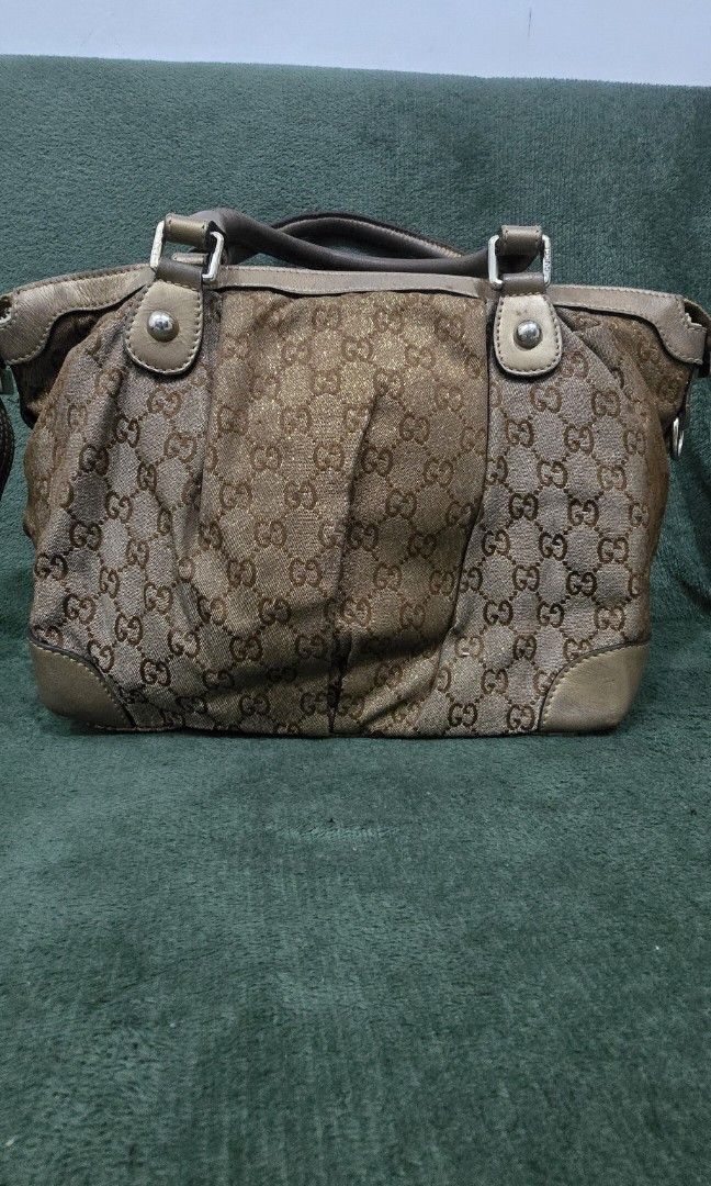 Gucci Sukey Handbag (Category: Luxury Bags & Wallets) located in Bacoor. Submitted by deux_trading_corporation (Listing ID 1444424362, Image 3). Description: 21k and above on 2ndhand market. condition: Rank AB - has normal signs of wear but no damage whatsoever. needs bags spa. payment first. you can always ask for discount/tawad but no to sobrang barat. no reservation. always check all the photos. some photo/s indicate the flaw..