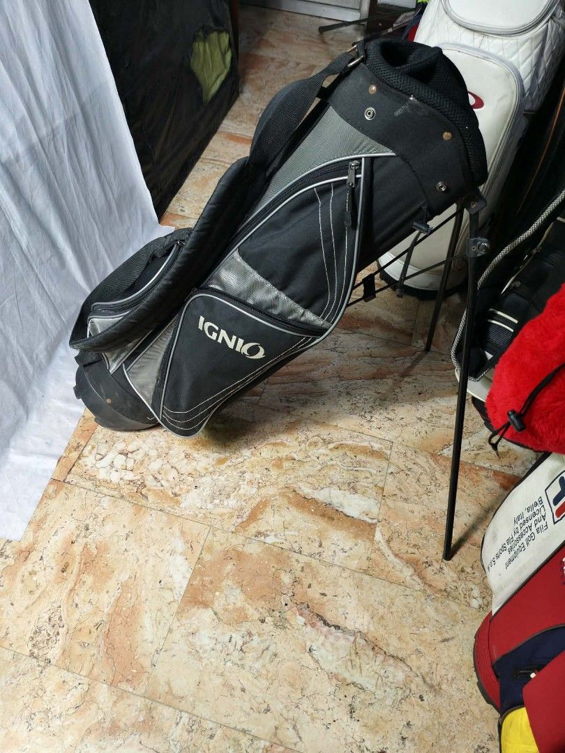 Ignio Golf Stand Bag & Oakley Golf Bag (Category: Golf) located in Manila. Submitted by yeonmei5614747 (Listing ID 1444447539, Image 2). Description: - Ignio Stand Bag: Black & Silver, includes strap and legs.No Hood cover.. 2500 - Oakley Golf Bag: White with distinctive logo and graphic.no hood cover. there is issue.. check on images.. price: 2000 .