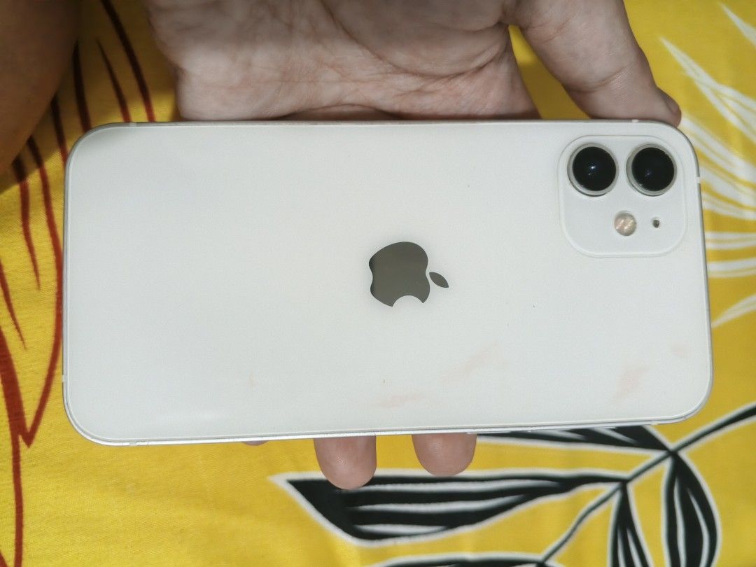 Iphone 12 (Category: iPhone 12 Series) located in Manila. Submitted by lucydelacruz17 (Listing ID 1444436773, Image 1). Description: iphone 12 128gb battery health 74% no face id due updtae minsan biglang magkakaron true tone ✔ makinis pa wala gano dents yung back nalagyan paint then nahirapan nako alisin .