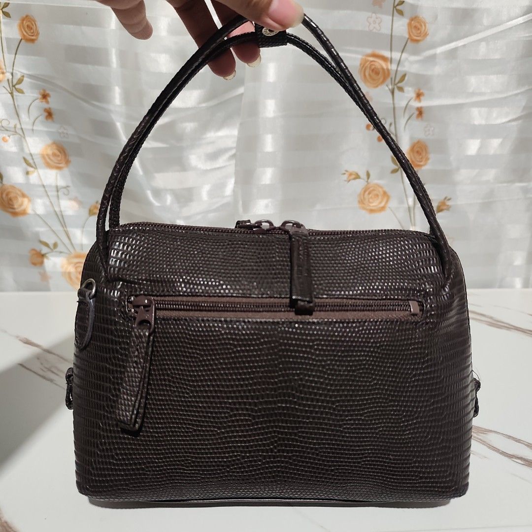 JRA Genuine Lizard Skin Shoulder Bag (Category: Shoulder Bags) located in Binalonan. Submitted by jarnimzurccc (Listing ID 1444436170, Image 2). Description: JAPAN sourced! 🌸✨ YKK zipper. Gamuza inner lining. Chocolate brown color in actual. Small size only Dimensions Height: 6.5 inches Length: 8 inches Width: 3 inches.
