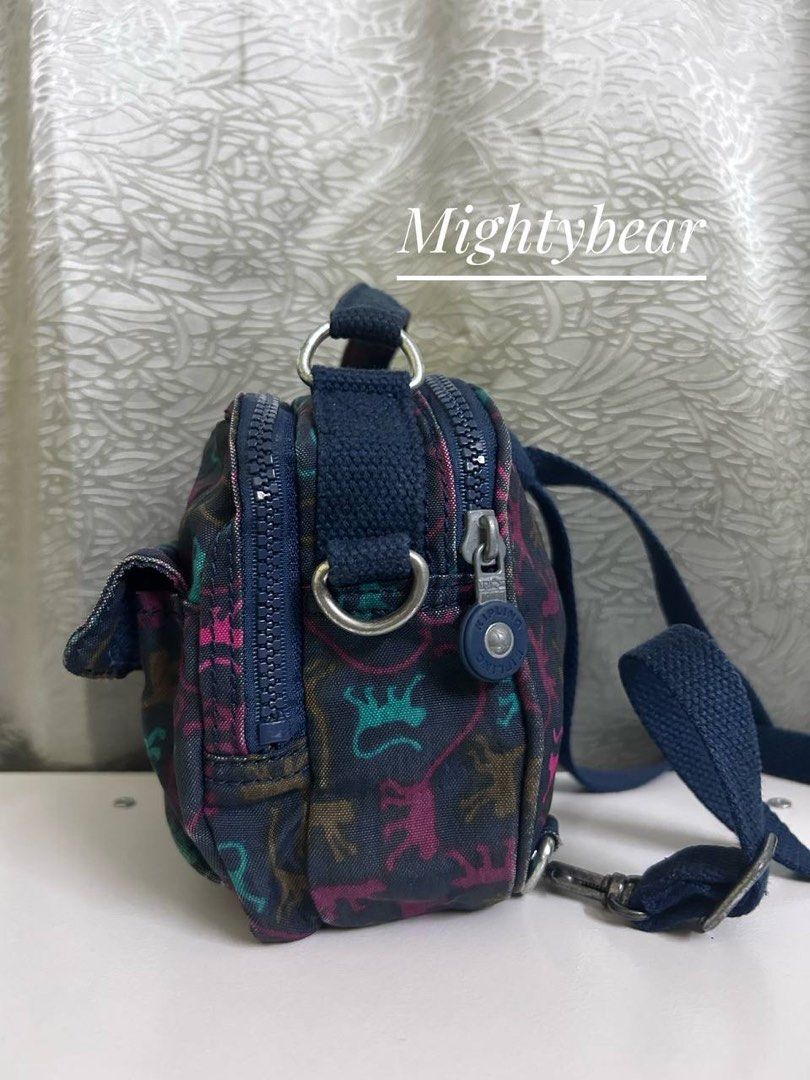 Kipling (Category: Backpacks) located in Ipoh. Submitted by mightybear_500 (Listing ID 1444387027, Image 3). Description: Kipling. Small backpack for kids/ sling or crossbody for adult. Colorful, multi monkey print. Monkey Fun. Made In China. takde 🐒. Bebas koyak dan kotoran. Bahagian tepi(piping) ada sedikit color faded. Bahagian pemegang atas tu sepatutnya ada logo kipling tapi kita dah bersihkan dan cabut sebab pu leather dah crack. ( if u ki