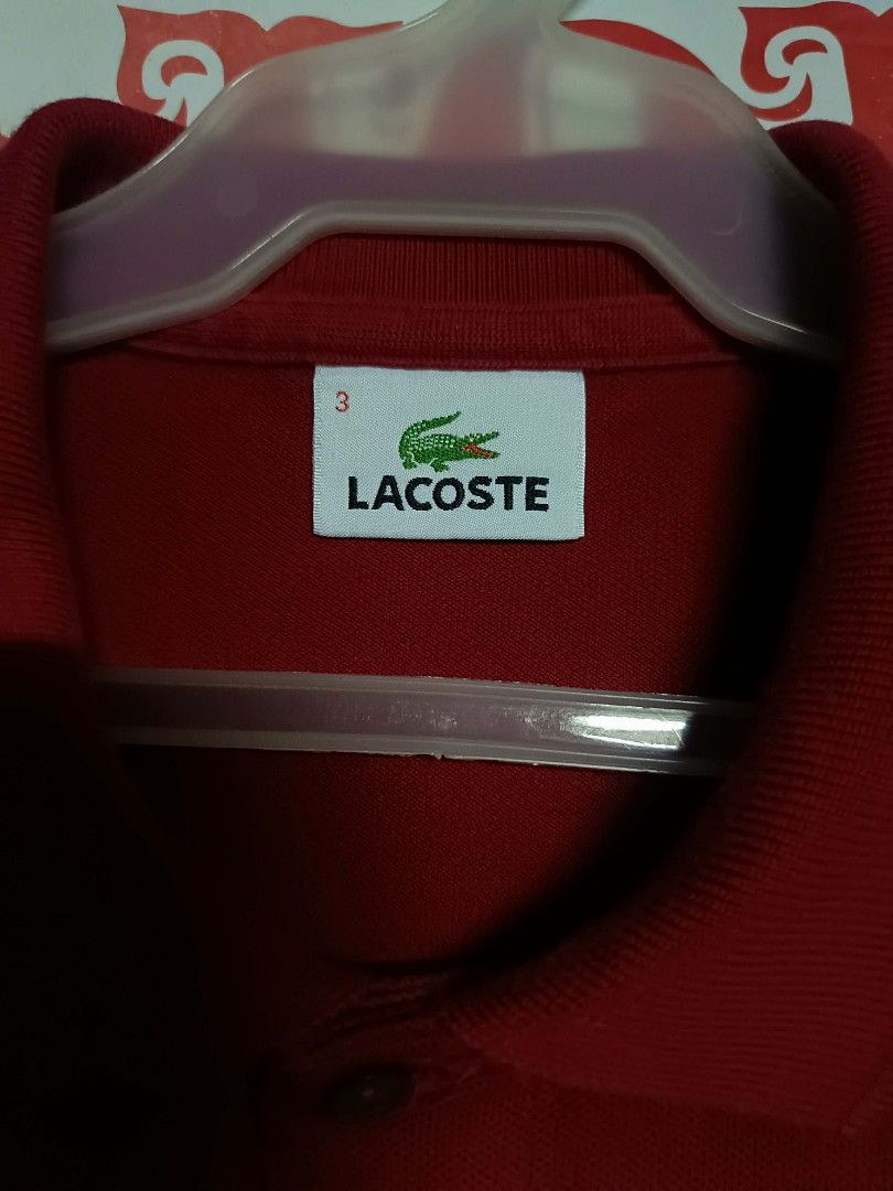 Lacoste Red Polo Shirt Size 3 (Category: Tshirts & Polo Shirts ) located in Makati City. Submitted by elgamapenumbra (Listing ID 1444416081, Image 3). Description: - Classic red Lacoste polo shirt - Features iconic crocodile logo on chest - Two-button placket - Comfortable material - Tagged size 3 - Ideal for casual wear -100% Original Lacoste. -With Authentication..