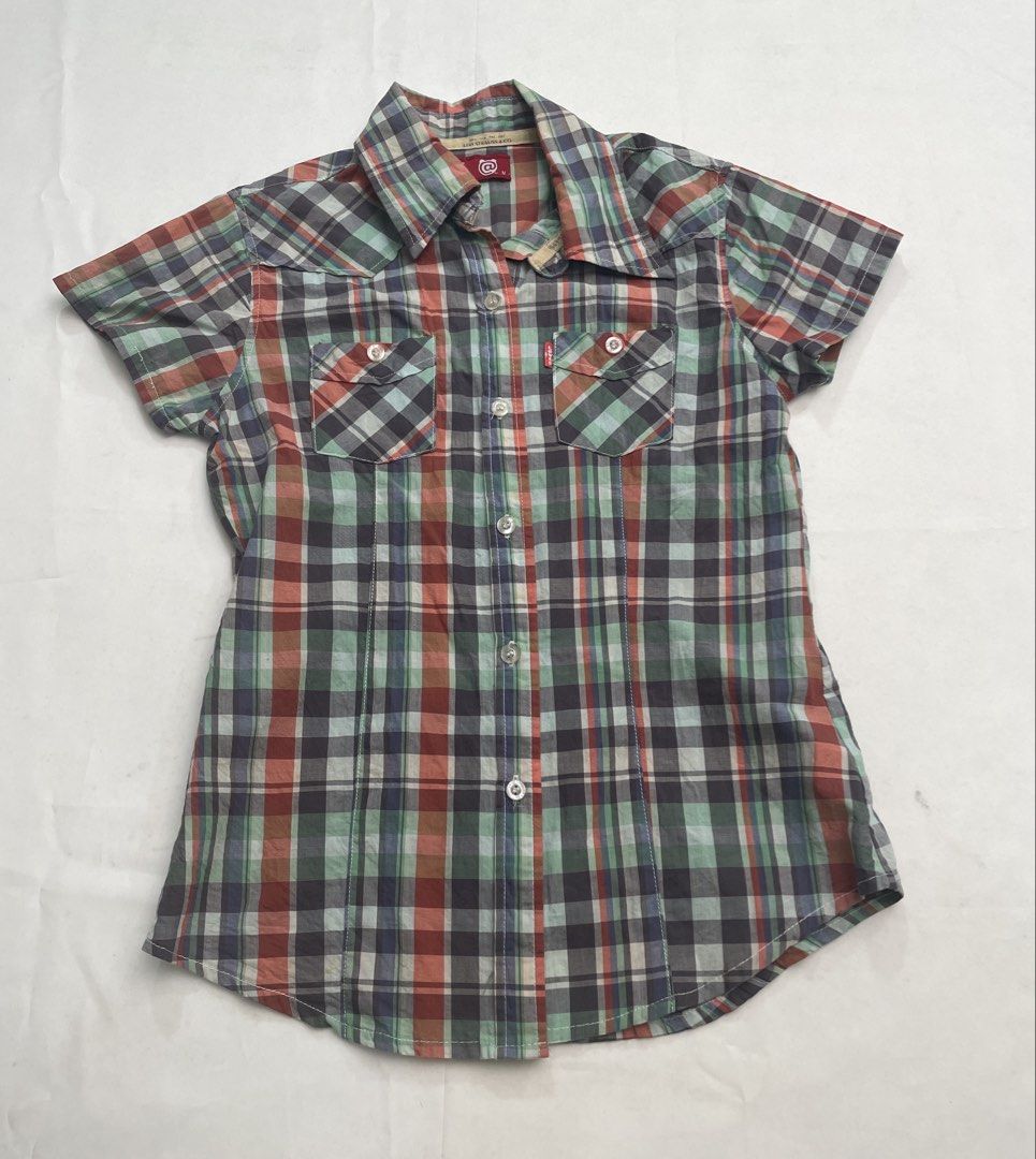 Levis Plaid Short Sleeve Blouse Shirt (Category: Blouses) located in Makati City. Submitted by pepperstoremerch (Listing ID 1444449730, Image 1). Description: Levis Plaid Short Sleeve Shirt Blouse Top Collared Size Medium but can fit XS (it’s very small) Preloved, very good condition Please see pictures D0062.