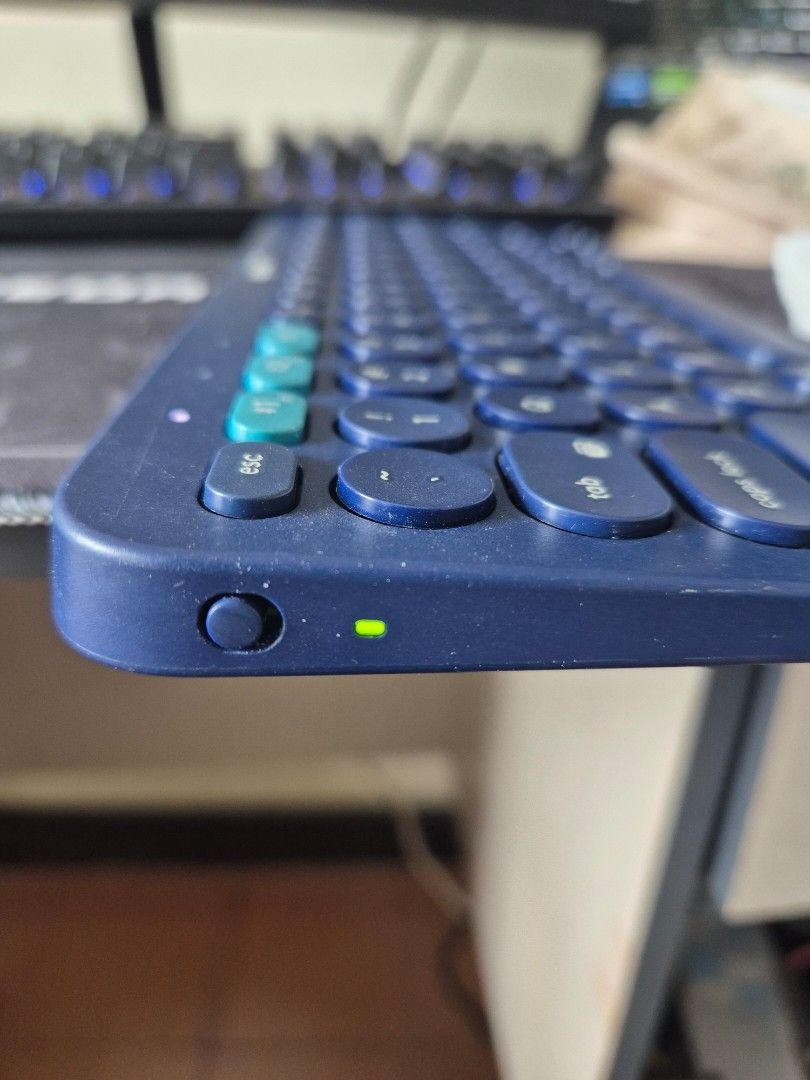 Logitech K380 Bluetooth Keyboard (Category: Computer Keyboard) located in Makati City. Submitted by zotag (Listing ID 1444313405, Image 3). Description: - Dark blue Logitech K380 keyboard - Connects via Bluetooth to up to 3 devices simultaneously - Features comfortable round keys - Shows minor scuff marks on casing and feet from normal use - Fully functional and works great - Selling because I upgraded to a new keyboard.