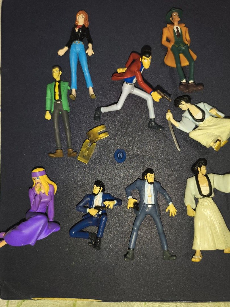 Lupin the Third Action Figure Set (Category: Figurines & Statues) located in Manila. Submitted by v2Zuio (Listing ID 1444325200, Image 1). Description: - Complete set of Lupin the Third action figures - Includes Lupin, Jigen, Goemon, Fujiko, and Inspector Zenigata - Some figures come with accessories like guns and a sword - Perfect for fans of the classic anime series.