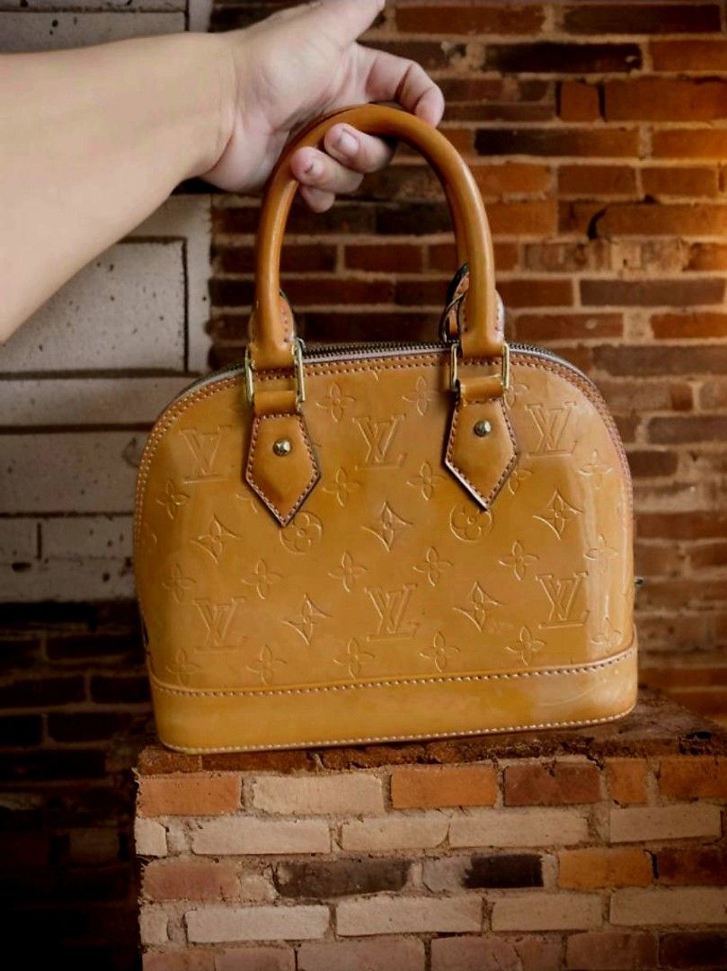 LV vernis alma (Category: Luxury Bags & Wallets) located in Manila. Submitted by bellissima05 (Listing ID 1444341970, Image 1). Description: Louis Vuitton Introducing the Louis Vuitton Alma BB Vernis Brown, a beautifully crafted bag that captures the essence of luxury in a compact, stylish form. Perfect for the modern woman who values both sophistication and practicality, this iconic piece from Louis Vuitton is a must-have addition to any fashion