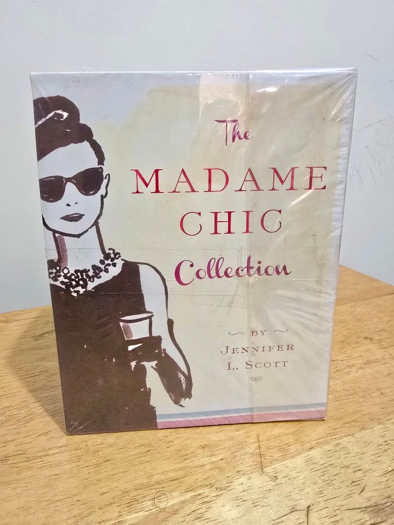 Madame Chic Book Set by Jennifer L. Scott (Category: Storybooks) located in Taguig. Submitted by blessitforward (Listing ID 1444446018, Image 1). Description: - Set of 3 books by Jennifer L. Scott - Titles included: 'Your Poise with Madame Chic', 'In Home with Madame Chic', 'Lessons from Madame Chic' - All books are brand new and shrink-wrapped together - Ideal for those interested in French style and elegant living.