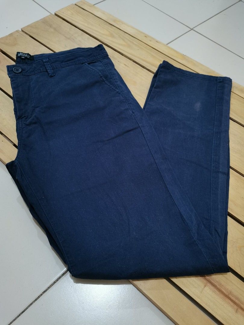 MEMO BASIC Navy Blue Chinos Size 34 (Category: Chinos) located in Pasig City. Submitted by raindeclutters (Listing ID 1444324713, Image 1). Description: - MEMO BASIC navy blue chinos - Size: 34 - Fit: Classic - Style: Versatile for casual or smart casual wear - Closure: Button and zip - Pockets: Two side, two back - Material: Feels like a comfortable cotton blend - A great staple piece for any wardrobe *small discoloration as seen on photo *price