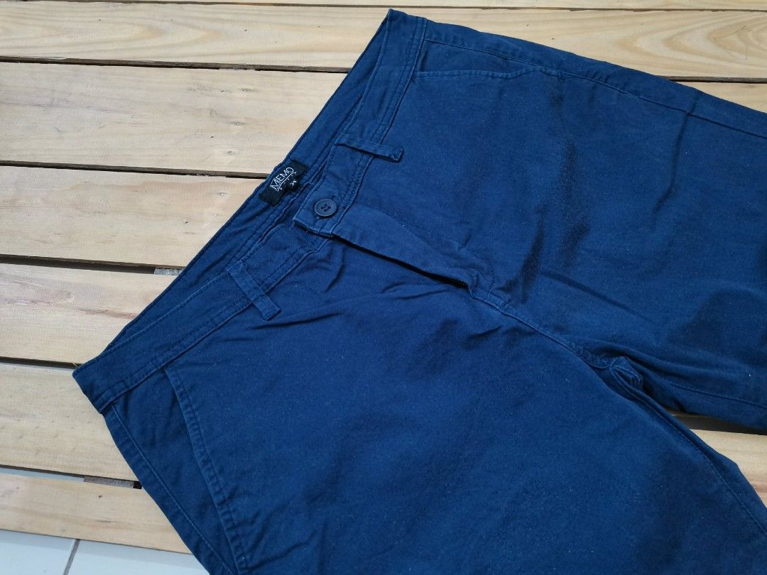 MEMO BASIC Navy Blue Chinos Size 34 (Category: Chinos) located in Pasig City. Submitted by raindeclutters (Listing ID 1444324713, Image 3). Description: - MEMO BASIC navy blue chinos - Size: 34 - Fit: Classic - Style: Versatile for casual or smart casual wear - Closure: Button and zip - Pockets: Two side, two back - Material: Feels like a comfortable cotton blend - A great staple piece for any wardrobe *small discoloration as seen on photo *price
