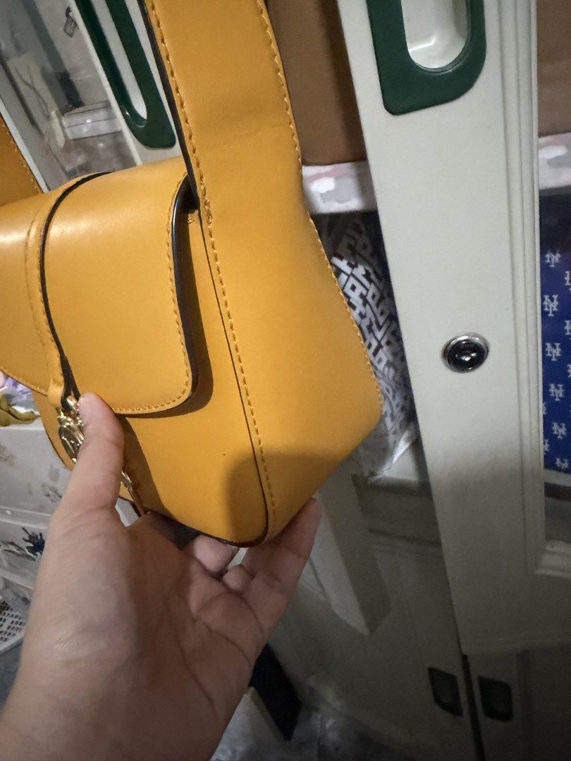 Flash sale:Michael Kors Lyra Crossbody (Category: Cross-body Bags) located in Davao. Submitted by mydearest20 (Listing ID 1444404342, Image 2). Description: original legit MK lyra golden yellow used once maganda to promise worth it 4250.
