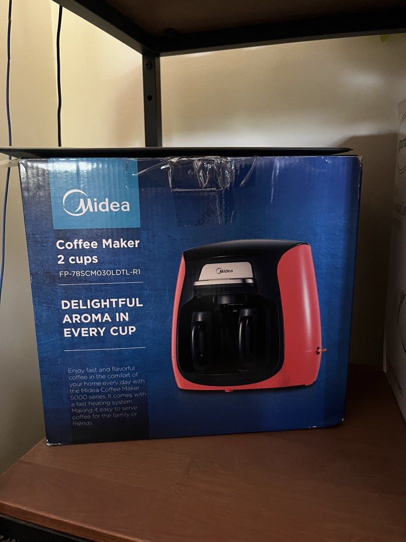 Midea Coffee Maker 2 Cups FP-785CM030LDTL-R1 (Category: Coffee Machines & Makers) located in Cavite. Submitted by letsgosab (Listing ID 1444430895, Image 1). Description: - Midea Coffee Maker - Model: FP-785CM030LDTL-R1 - Capacity: 2 cups - Features: Fast heating system for quick, flavorful coffee - Color: Red and Black - Ideal for brewing coffee at home for yourself or guests.