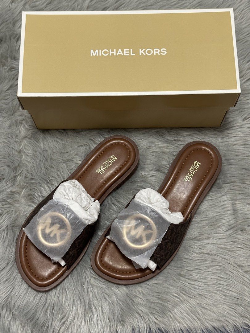 MK Hannah Flat slide (Category: Flats & Sandals) located in Pateros City. Submitted by stuffcornerph (Listing ID 1444352668, Image 1). Description: Bought in US.. Size 6.