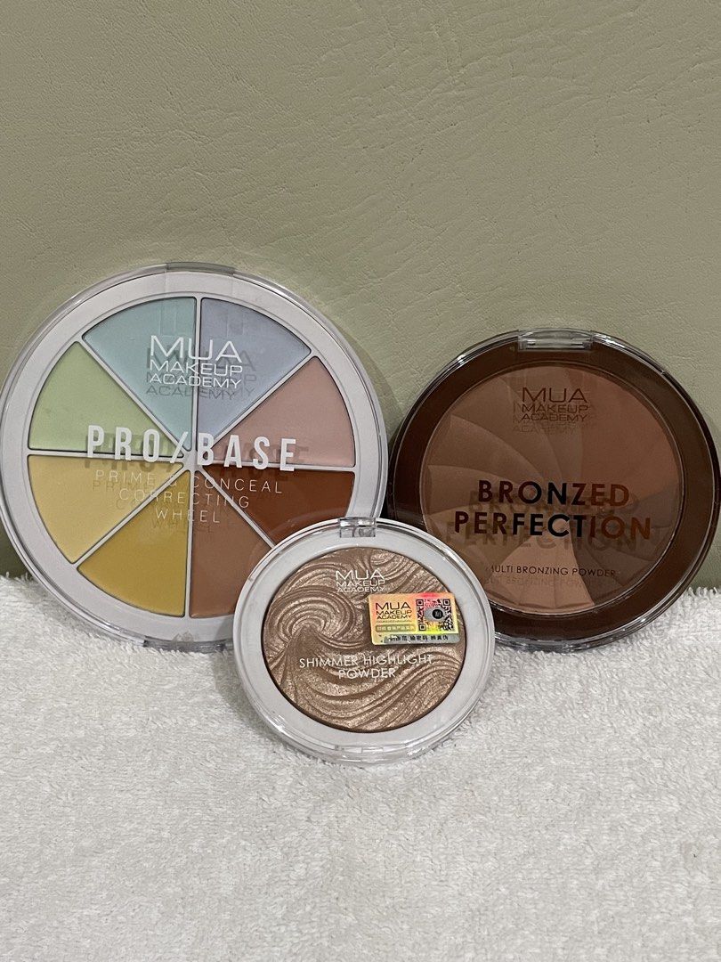 MUA Makeup Academy Bronzed Perfection, Pro/Base, Shimmer Highlight (Category: Makeup) located in Caloocan City. Submitted by stashforless (Listing ID 1444401189, Image 1). Description: Bundle - MUA Makeup Academy 3-piece set - Includes: Pro/Base Prime Conceal Correcting Wheel, Bronzed Perfection Multi Bronzing Powder, Shimmer Highlight Powder - Ideal for contouring, concealing, and achieving a radiant glow.