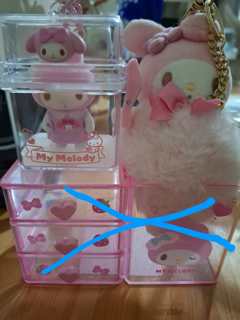 My Melody figure and charm (Category: Storage Boxes & Baskets) located in Orion. Submitted by timburtonfan (Listing ID 1443913419, Image 1). Description: melo organizer sold 🥰.