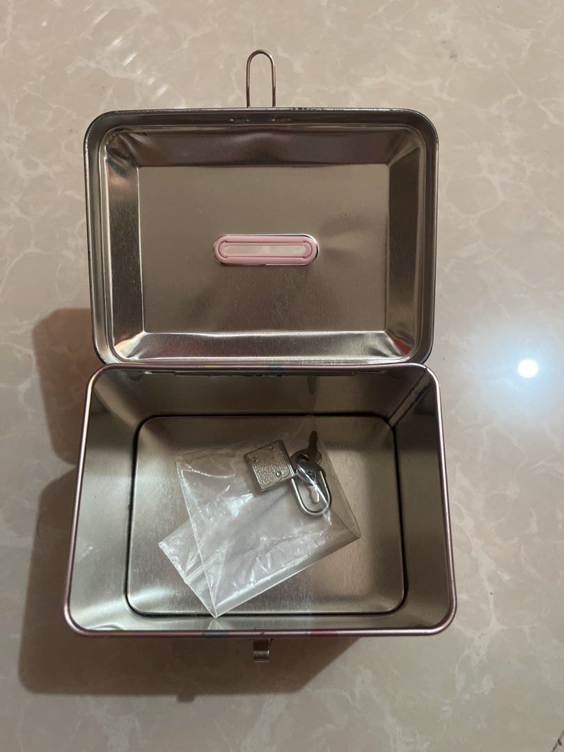 My Melody Pink Tin Box with Lock and Keys (Category: Storage Boxes & Baskets) located in Bay. Submitted by ronellie (Listing ID 1444331446, Image 3). Description: - Adorable pink tin box featuring My Melody - Features a coin/note slot on top - Comes with a small lock and 2 keys - Ideal for storing small treasures or as decor - A must-have for My Melody fans!.