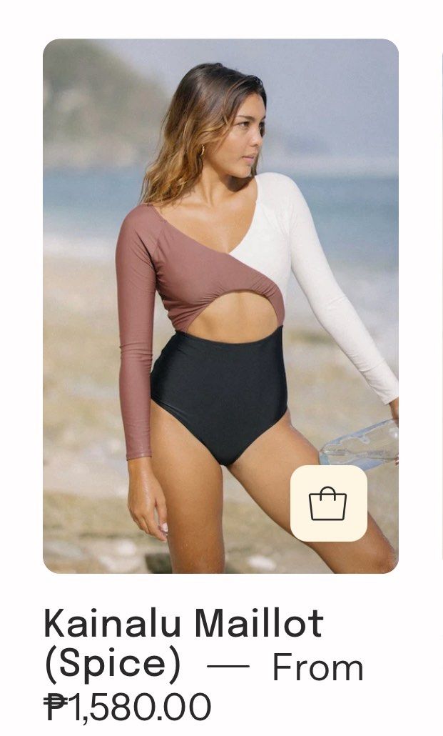 Nekid Long Sleeve One Piece Swimsuit (Category: Bikinis & Swimsuits) located in Antipolo. Submitted by hm_cyst (Listing ID 1444331734, Image 3). Description: - Brand: Nekid - Style: Long sleeve one-piece swimsuit - Design: Colorblock with white and mauve sleeves - Bottom: High-waisted black - Features: Open back with tie detail - Ideal for: Surfing, swimming - Benefits: Comfortable and stylish.