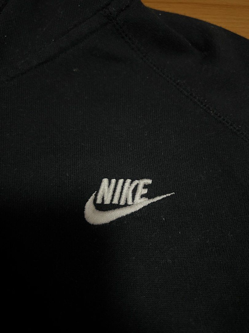 Nike Black Zip-Up Hoodie (Category: Coats, Jackets and Outerwear) located in Manila. Submitted by since2021_ (Listing ID 1444417104, Image 2). Description: - Classic black Nike hoodie - Full zip closure - Embroidered Nike swoosh logo on chest - Front pouch pocket - Drawstring hood - Ideal for everyday wear or workouts.