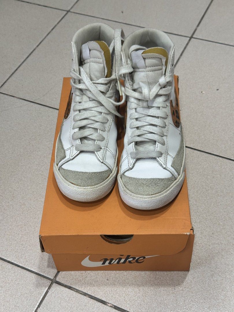 Nike Blazer Mid 77 SE Leopard Print Sneakers #6 (Category: Sneakers) located in Cainta. Submitted by equinoxph (Listing ID 1444348326, Image 3). Description: - White Nike Blazer Mid '77 SE High-top Sneakers - Features a unique leopard print Nike Swoosh - Includes original box - US Women’s Size 5 - Ideal for casual wear and adding a stylish touch to your outfits.