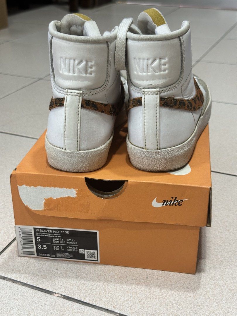 Nike Blazer Mid 77 SE Leopard Print Sneakers #6 (Category: Sneakers) located in Cainta. Submitted by equinoxph (Listing ID 1444348326, Image 2). Description: - White Nike Blazer Mid '77 SE High-top Sneakers - Features a unique leopard print Nike Swoosh - Includes original box - US Women’s Size 5 - Ideal for casual wear and adding a stylish touch to your outfits.