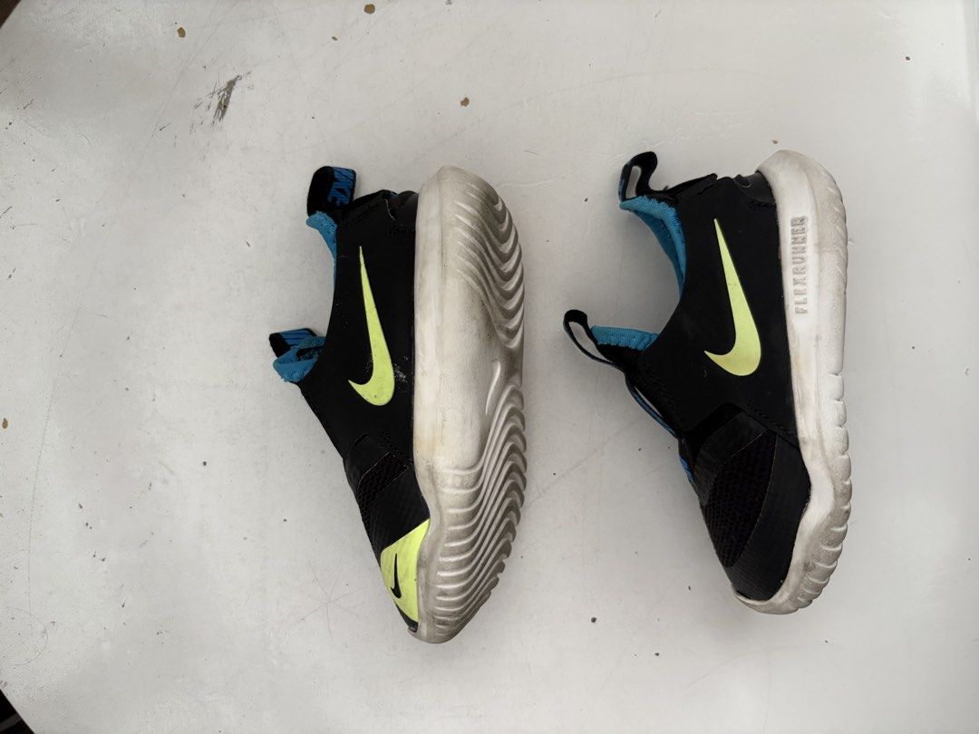 Nike Flex Runner Toddler Shoes Black Volt Blue C8 (Category: Babies & Kids Fashion) located in Quezon City. Submitted by mmaryf (Listing ID 1444344751, Image 3). Description: - Nike Flex Runner toddler shoes - Color: Black with Volt Green accents and Blue detailing - Easy slip-on design with elastic straps - Ideal for active toddlers and playtime - Comfortable and stylish kicks.