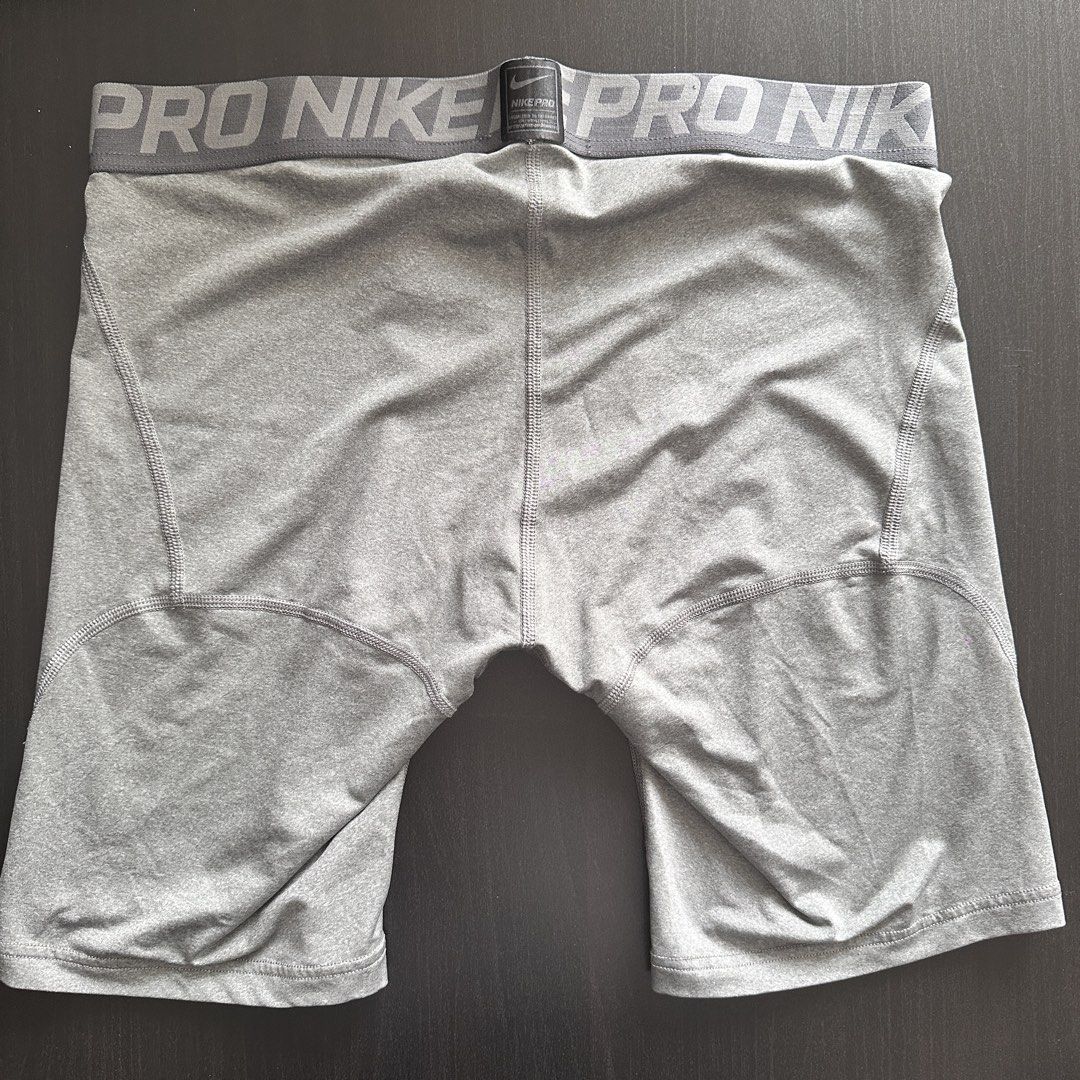Nike Pro Dri-FIT Compression Shorts Grey XXL (Category: Activewear) located in Quezon City. Submitted by angelicayoung (Listing ID 1444373107, Image 3). Description: - Grey Nike Pro Dri-FIT compression shorts - Size XXL - Ideal for workouts and sports - Made with polyester and spandex blend for stretch - Breathable mesh panel in the front - Elastic waistband with Nike Pro branding.