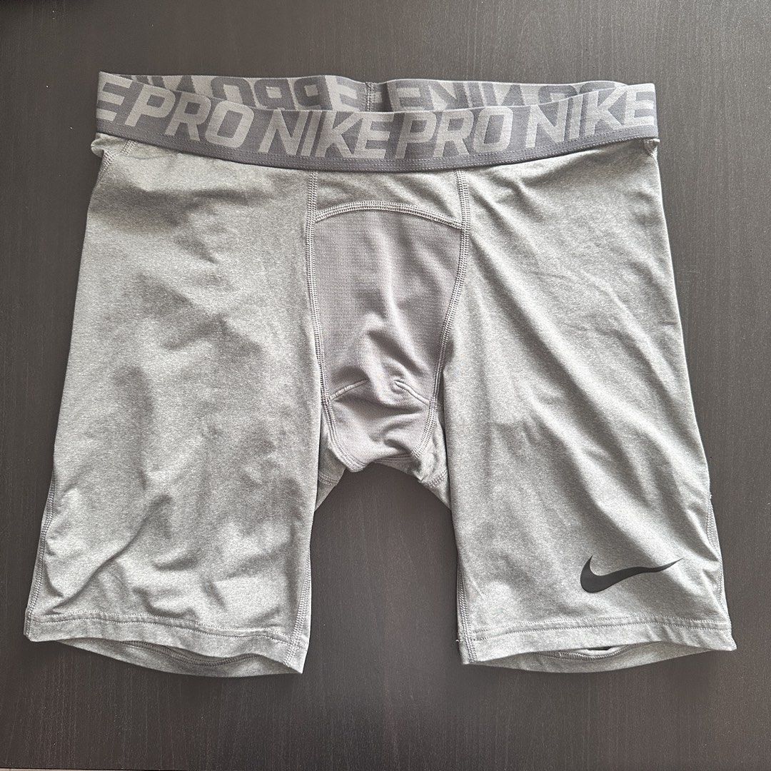 Nike Pro Dri-FIT Compression Shorts Grey XXL (Category: Activewear) located in Quezon City. Submitted by angelicayoung (Listing ID 1444373107, Image 1). Description: - Grey Nike Pro Dri-FIT compression shorts - Size XXL - Ideal for workouts and sports - Made with polyester and spandex blend for stretch - Breathable mesh panel in the front - Elastic waistband with Nike Pro branding.