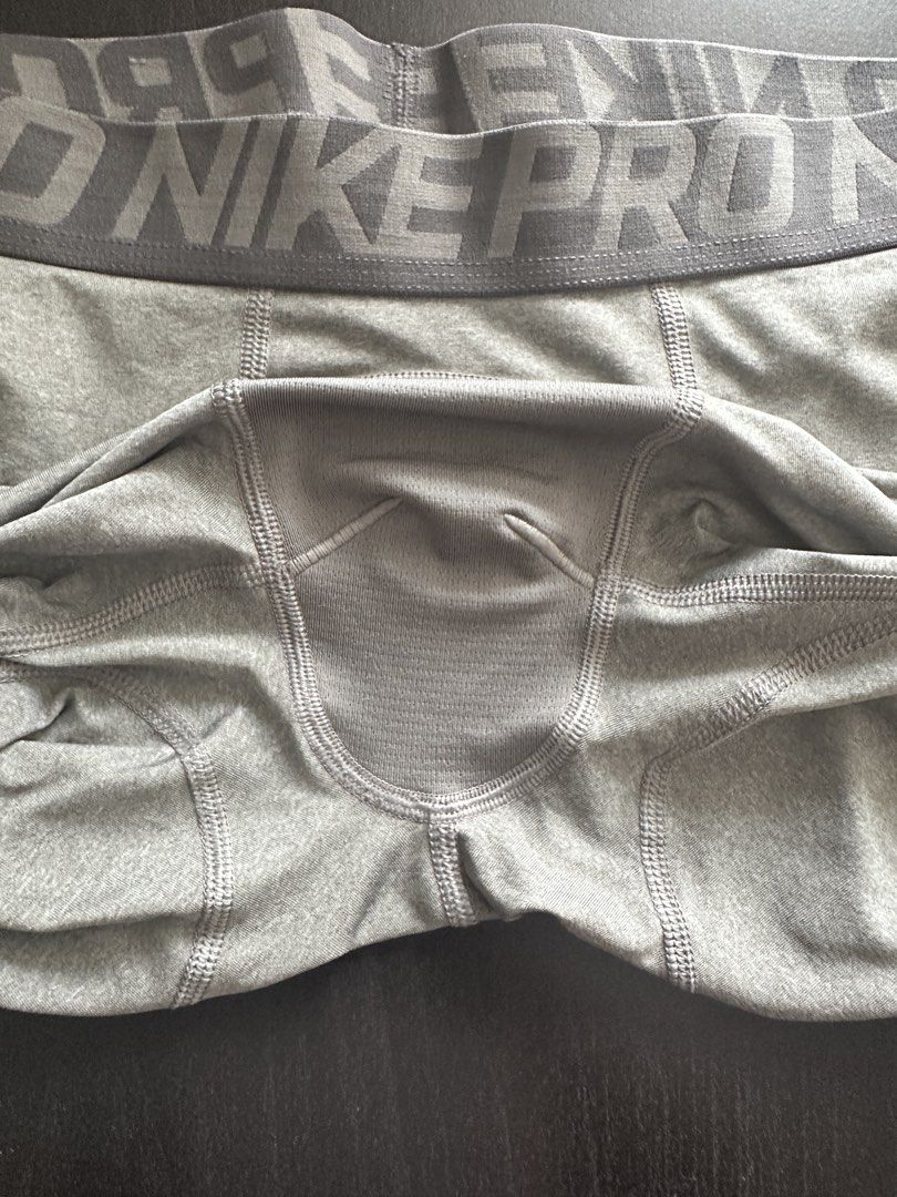 Nike Pro Dri-FIT Compression Shorts Grey XXL (Category: Activewear) located in Quezon City. Submitted by angelicayoung (Listing ID 1444373107, Image 2). Description: - Grey Nike Pro Dri-FIT compression shorts - Size XXL - Ideal for workouts and sports - Made with polyester and spandex blend for stretch - Breathable mesh panel in the front - Elastic waistband with Nike Pro branding.