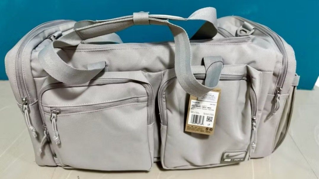 Nike utility duffel bag (Category: Backpacks) located in Baguio. Submitted by bravemoon-8a22 (Listing ID 1444476194, Image 1). Description: Nike Men's Utility Power 2.0 Duffel Bag (Medium, 51L) - College Grey [FN4208-009].