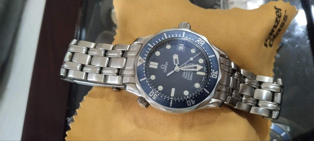 Omega Seamaster Professional 300M Automatic Men's Watch (Category: Men's Watches) located in Paranaque City. Submitted by vanillag0815 (Listing ID 1444311997, Image 1). Description: - Omega Seamaster Professional -mid 90’s - 2000 -36mm - Automatic movement - black dial with date window - Stainless steel bracelet - Water resistant 300m - Ideal for diving and everyday wear - Shows some signs of wear on bezel and bracelet - Still keeps accurate time