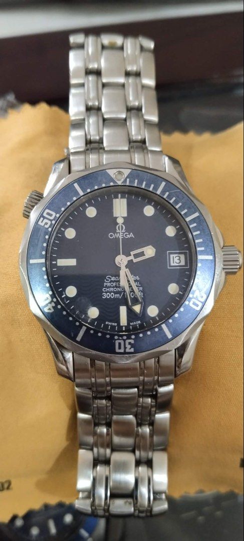 Omega Seamaster Professional 300M Automatic Men's Watch (Category: Men's Watches) located in Paranaque City. Submitted by vanillag0815 (Listing ID 1444311997, Image 2). Description: - Omega Seamaster Professional -mid 90’s - 2000 -36mm - Automatic movement - black dial with date window - Stainless steel bracelet - Water resistant 300m - Ideal for diving and everyday wear - Shows some signs of wear on bezel and bracelet - Still keeps accurate time