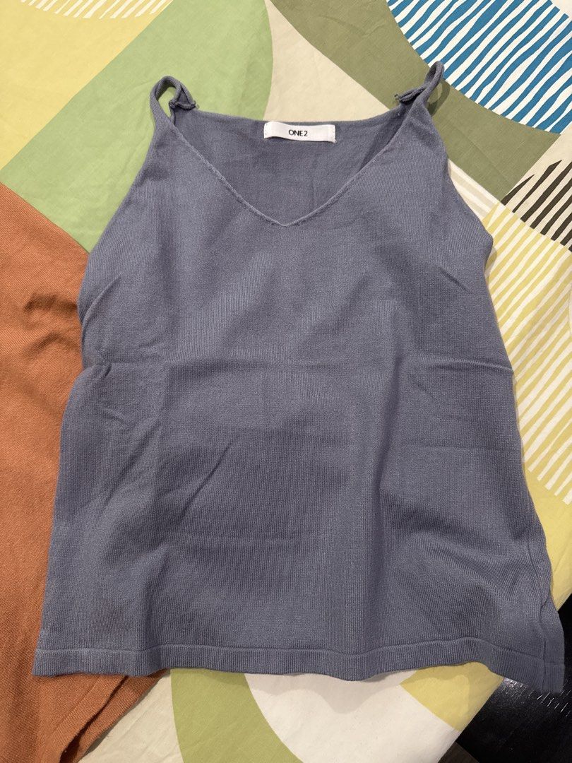 ONE2 Camisole Tops (2 pcs) - Brown & Blue (Category: Sleeveless) located in Manila. Submitted by 031620 (Listing ID 1444343672, Image 3). Description: - Set of two ONE2 camisole tops - Colors: Warm brown and cool blue - V-neckline design - Versatile for layering or wearing solo - Ideal for casual outfits.
