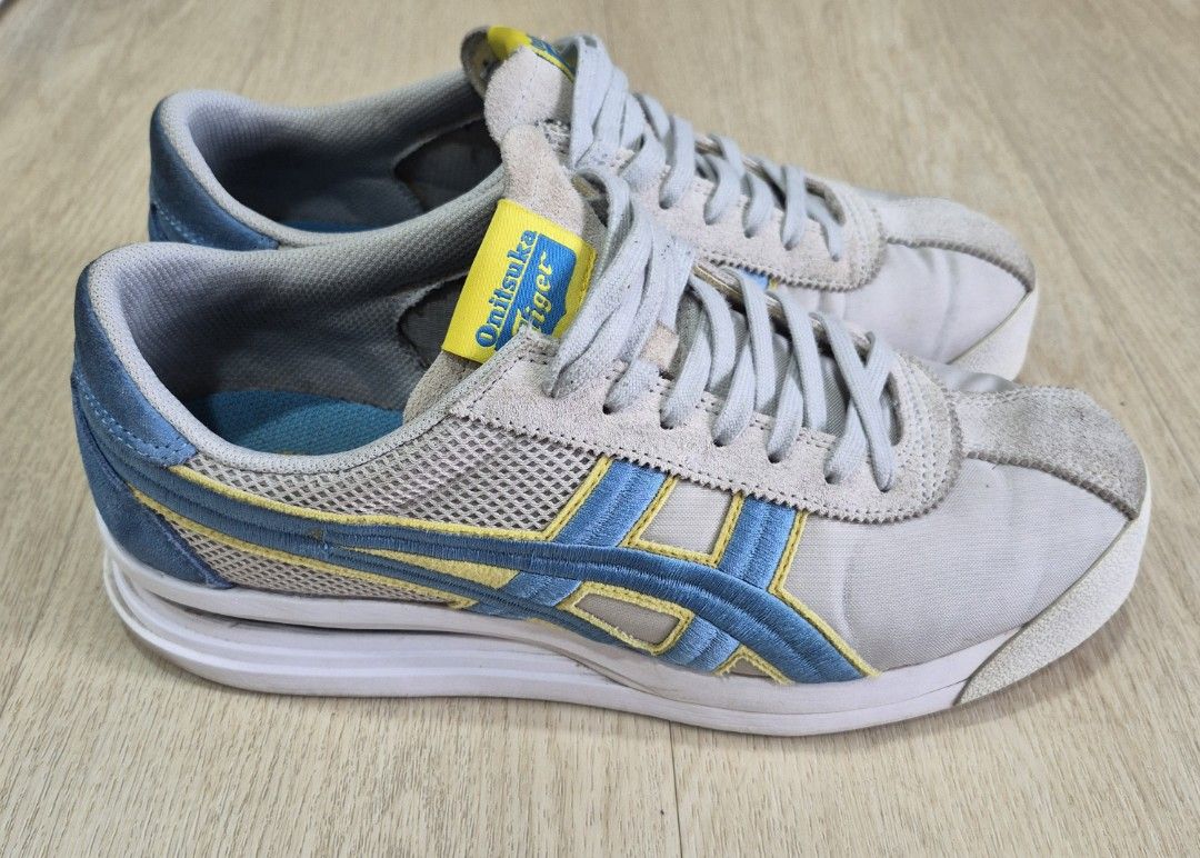 Onitsuka Tiger Mexico 66 Sneakers Grey Blue Yellow (Category: Sneakers) located in Singapore. Submitted by ririkoh (Listing ID 1444361631, Image 3). Description: - Onitsuka Tiger Mexico 66 sneakers - Size: US Men's 9 - Color: Grey with blue and yellow accents - Condition: Good, suitable for casual wear or light training - Feel free to ask any questions!.