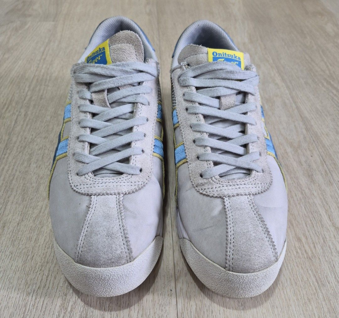 Onitsuka Tiger Mexico 66 Sneakers Grey Blue Yellow (Category: Sneakers) located in Singapore. Submitted by ririkoh (Listing ID 1444361631, Image 1). Description: - Onitsuka Tiger Mexico 66 sneakers - Size: US Men's 9 - Color: Grey with blue and yellow accents - Condition: Good, suitable for casual wear or light training - Feel free to ask any questions!.