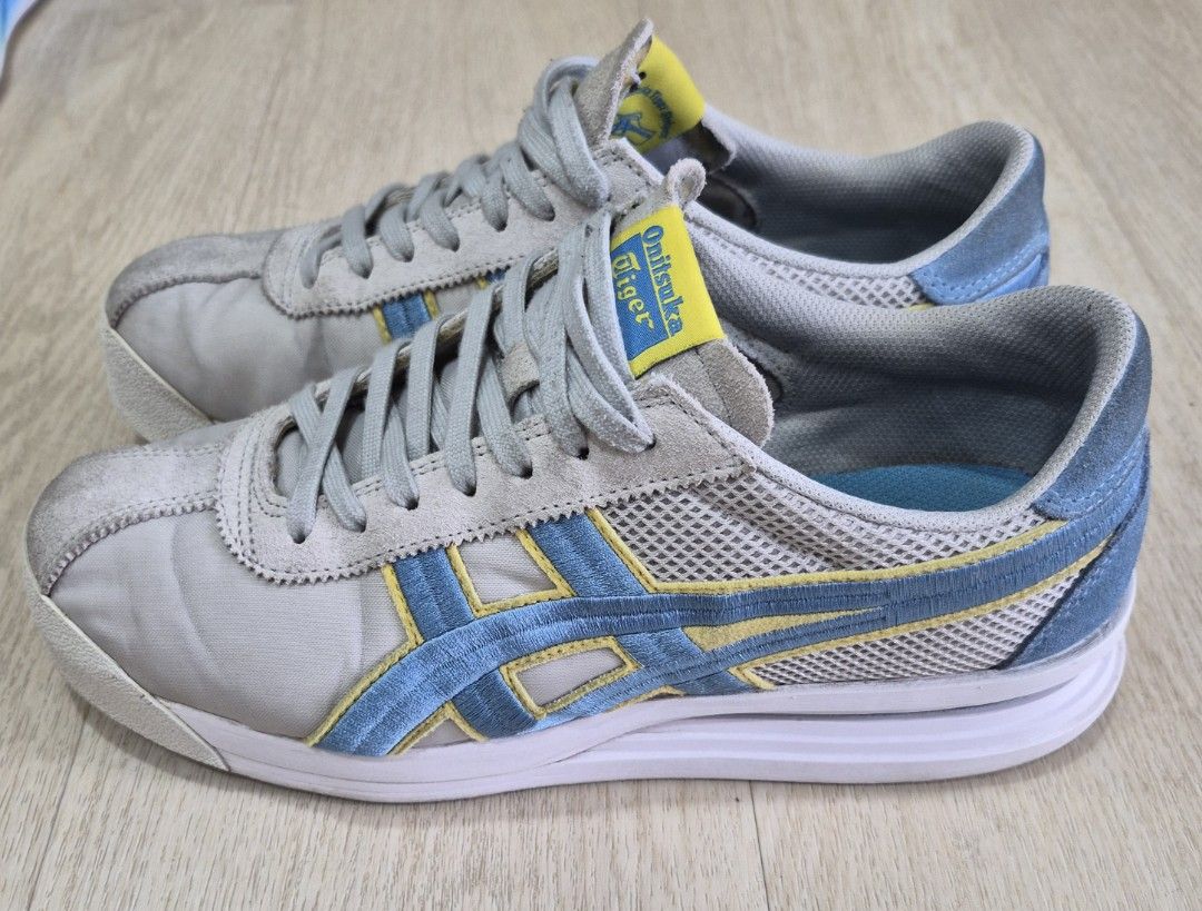 Onitsuka Tiger Mexico 66 Sneakers Grey Blue Yellow (Category: Sneakers) located in Singapore. Submitted by ririkoh (Listing ID 1444361631, Image 2). Description: - Onitsuka Tiger Mexico 66 sneakers - Size: US Men's 9 - Color: Grey with blue and yellow accents - Condition: Good, suitable for casual wear or light training - Feel free to ask any questions!.