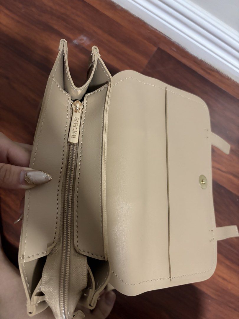 Parisian Beige Faux Leather Backpack (Category: Backpacks) located in Valenzuela. Submitted by pencakes_ (Listing ID 1444435197, Image 3). Description: khaki small bag perfect for school only opened, never been used rfs - decluttering shipping fee will be shouldered by the buyer :).