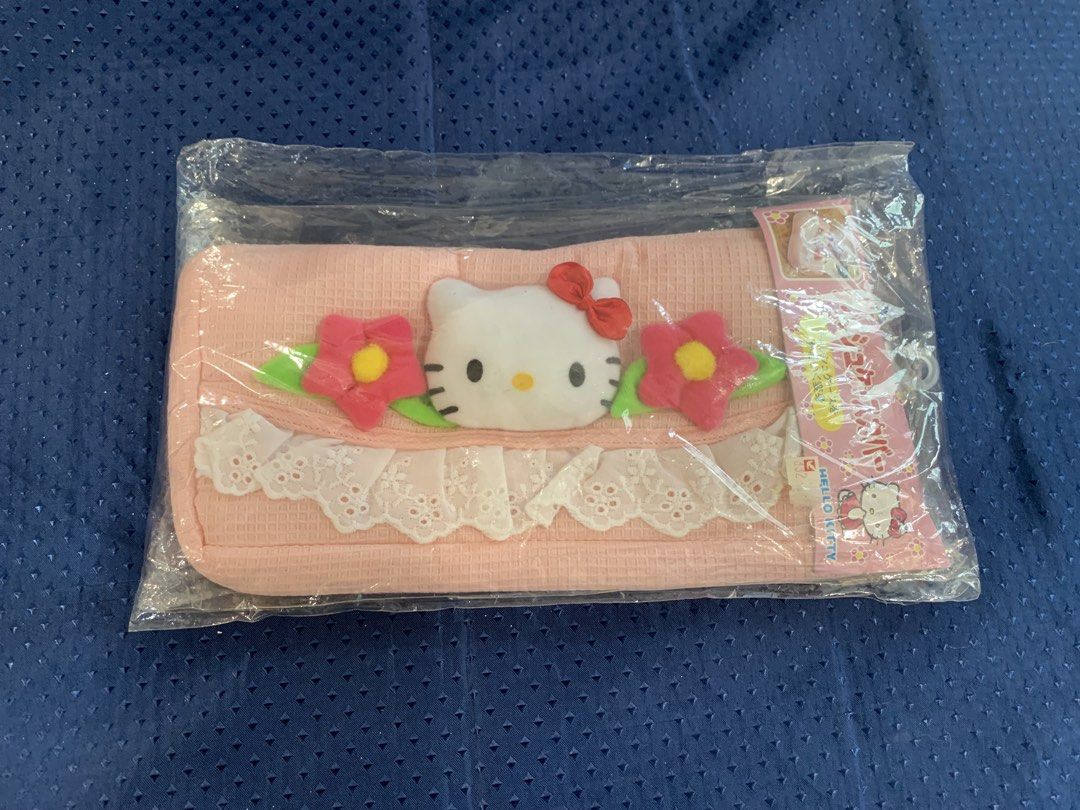 Pink Hello kitty tissue cover (Category: Looking For) located in Manila. Submitted by hellokitty_mnl (Listing ID 1444343007, Image 1). Description: - Adorable pink pouch featuring Kitty - Decorated with embroidered flowers and delicate lace trim - Ideal for organizing pens, makeup, or accessories - Brand new, still in original packaging - A must-have for any Kitty enthusiast!.