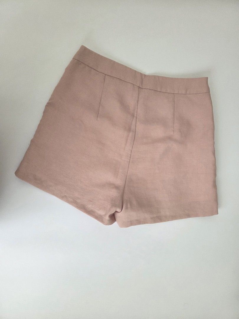 Pink Linen Blend High Waisted Shorts (Category: Shorts) located in Bacolod City. Submitted by maraline (Listing ID 1444408358, Image 2). Description: ​✨ Chic & Elegant Dusty Pink Tailored Shorts ✨ ​Looking for a classy, effortless piece for your weekend brunch or casual office looks? These high-waisted shorts feature a beautiful old rose/dusty pink shade with a clean, structured finish that instantly elevates any outfit. ​Features: ​Design: Flat-