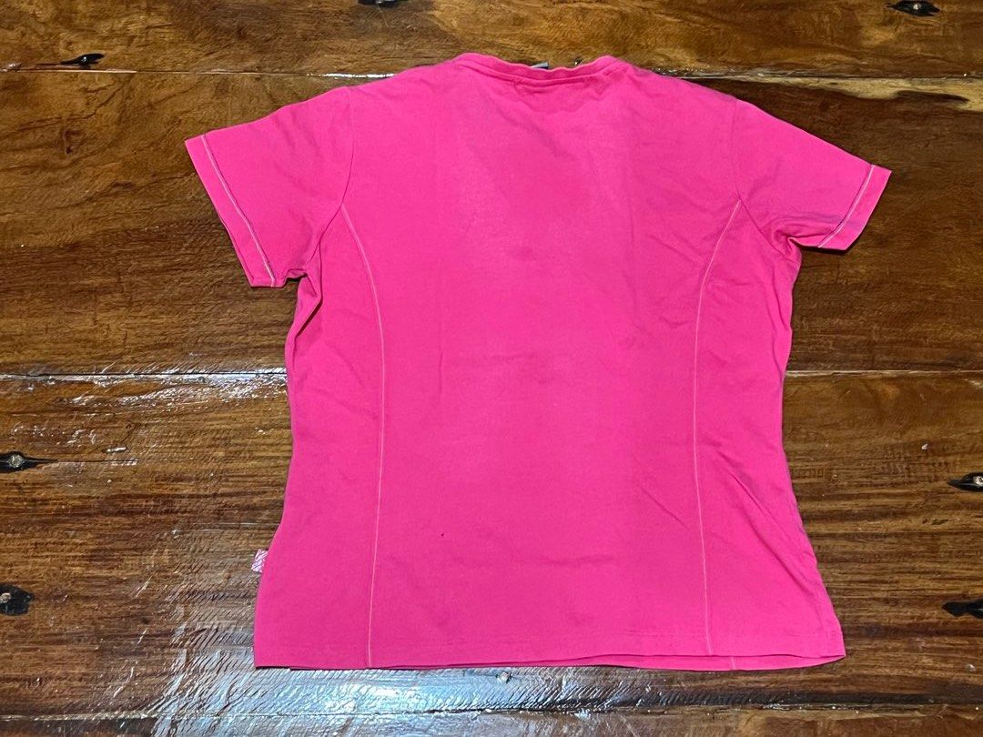 Pink T-shirt with Gold Logo (Category: Shirts) located in Leyte. Submitted by jcatle (Listing ID 1444367352, Image 2). Description: - Eye-catching bright pink t-shirt - Features a small, elegant gold logo on the chest - Unique stitching detail along the sides and sleeves - Designed for comfort and a casual feel - Versatile: great for workouts or everyday wear.