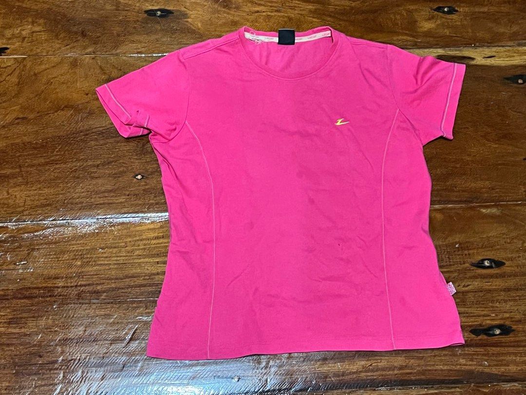 Pink T-shirt with Gold Logo (Category: Shirts) located in Leyte. Submitted by jcatle (Listing ID 1444367352, Image 1). Description: - Eye-catching bright pink t-shirt - Features a small, elegant gold logo on the chest - Unique stitching detail along the sides and sleeves - Designed for comfort and a casual feel - Versatile: great for workouts or everyday wear.