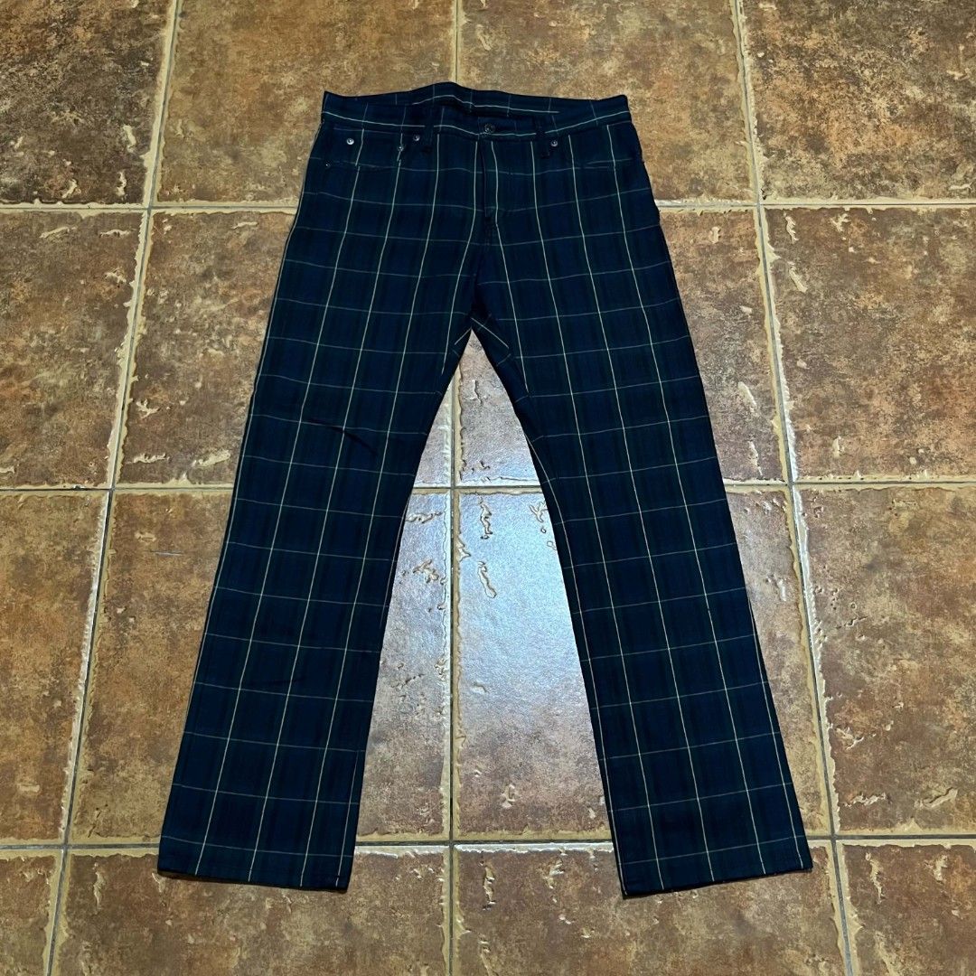 Plaid Pants Uni Qlo (Category: Jeans) located in Cagayan de Oro. Submitted by lootfindzzzz (Listing ID 1444470187, Image 2). Description: - Dark colored pants with a green plaid pattern - Straight leg fit - Standard button and zip closure - Brown leather patch on the back waistband - Perfect for casual wear.