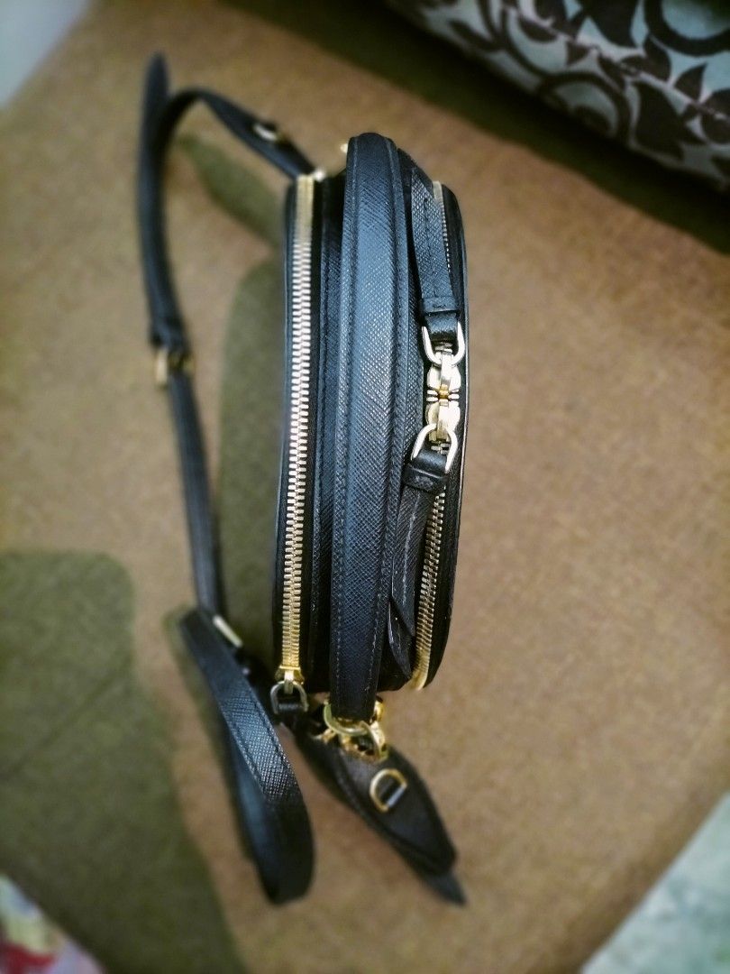 PRADA ODETTE 2WAY (Category: Luxury Bags & Wallets) located in Baguio. Submitted by gracialowxury_bags (Listing ID 1444385598, Image 2). Description: GOOD CONDITION... AUTHENTIC NOT GUARANTEED...NO ISSUE AT ALL....