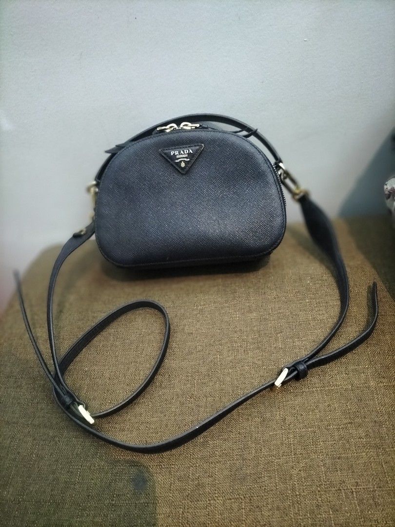 PRADA ODETTE 2WAY (Category: Luxury Bags & Wallets) located in Baguio. Submitted by gracialowxury_bags (Listing ID 1444385598, Image 1). Description: GOOD CONDITION... AUTHENTIC NOT GUARANTEED...NO ISSUE AT ALL....
