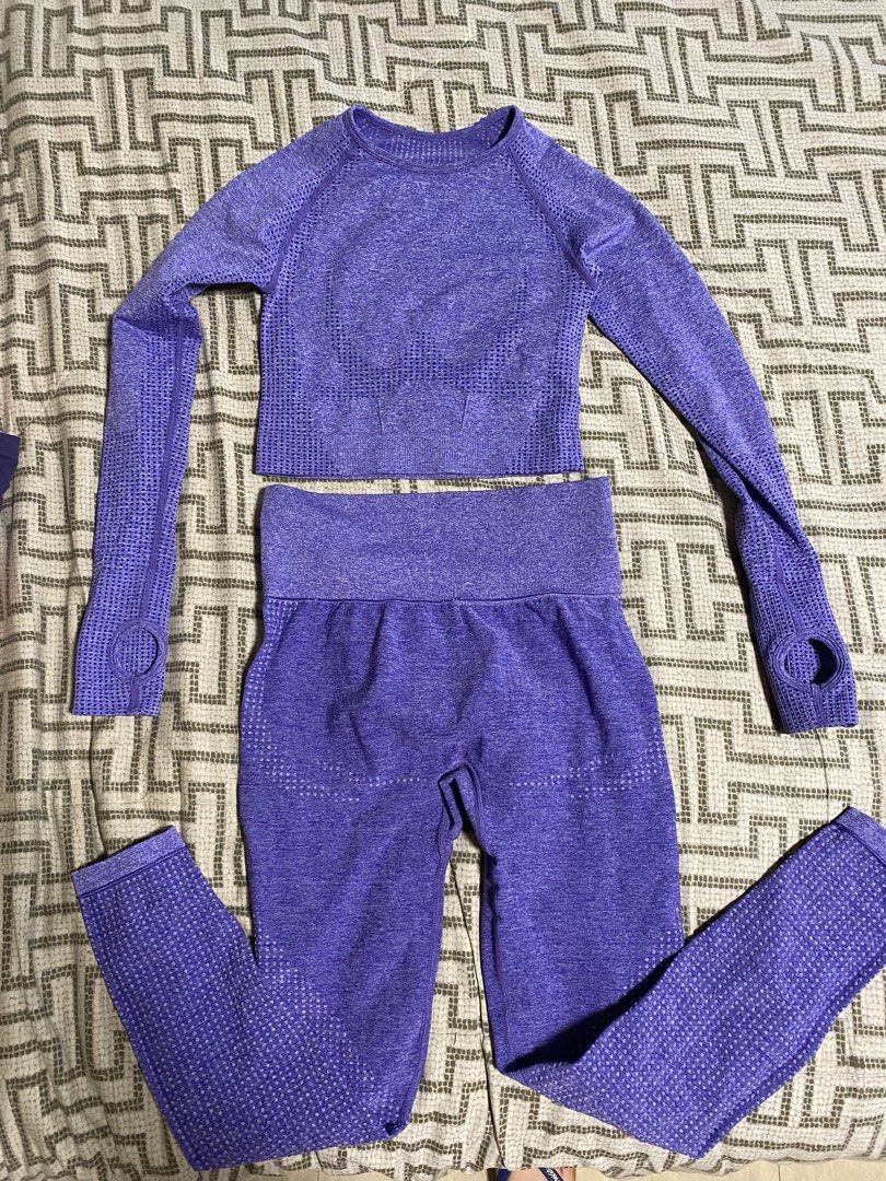 Purple Workout Set - Crop Top & Leggings (Category: Activewear) located in Makati City. Submitted by s_mimi (Listing ID 1444309931, Image 1). Description: - Purple activewear set - Includes long-sleeve crop top with thumbholes - High-waisted leggings - Breathable knit fabric with textured details - Comfortable and stretchy material - Ideal for gym or yoga sessions Free size .